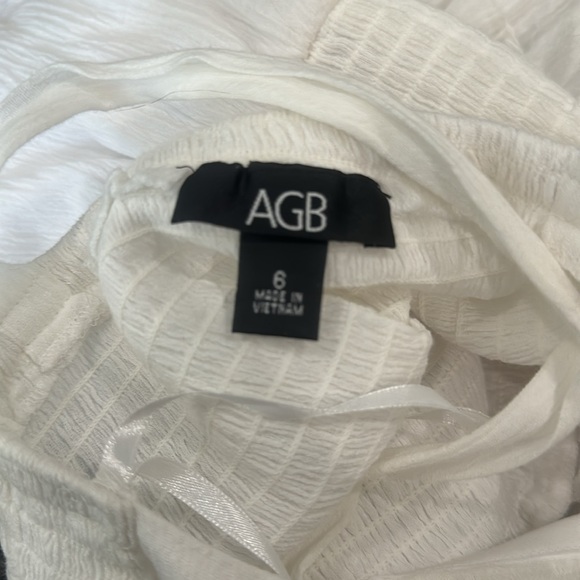 White Ruffle Sun Dress with Criss-Cross Bodice, Smocked Waistline & Full Skirt - Picture 9 of 10